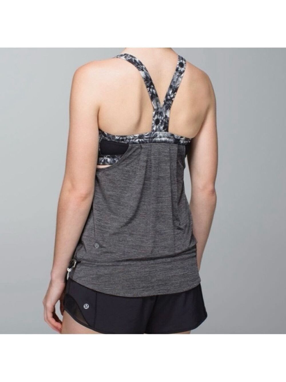 Lululemon Restless Tank
Heathered Black / Flowabunga Black Angel Wing Size 4